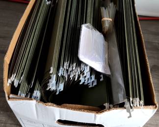 134. $10 -- Box Full of Hanging Folders