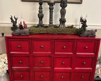 Red cabinet. 2 drawers on top and 2 cabinet doors below
