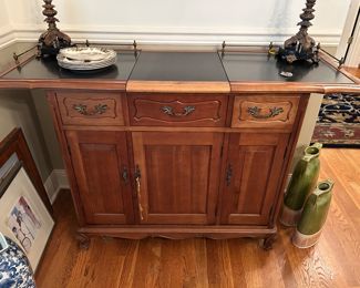 buffet / sideboard / bar. center piece removes so sides can slide together