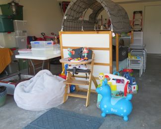 Full garage featuring Ikea Youth Bed and lots of Baby Items