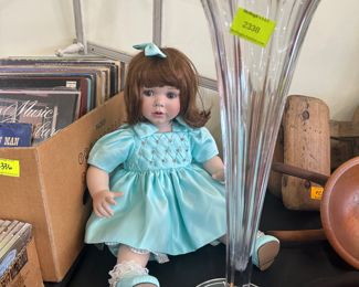 Marie Osmond doll and tall antique vase