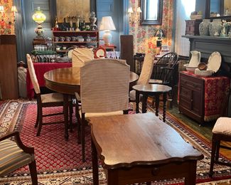 Rooms, full of rugs, tables and furnishings