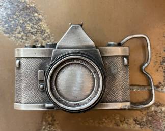 Camera belt buckle 