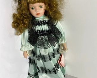 Greeneyed porcelain doll