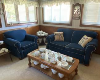Loveseat and Chair Set; Coffee Table with glass inset; Side Tables; Milk Glass pieces displayed 
