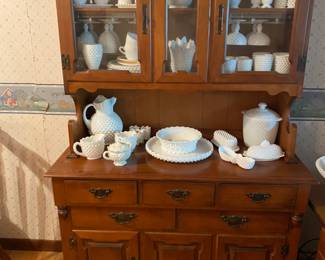 Milk Glass pieces Displayed on Hutch Buffet