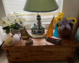 Lighthouse lamp and antique chest 