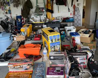 Tables of tools and boating items. 
