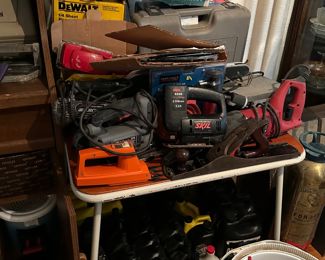 Pile of tools & Harley Davidson oil