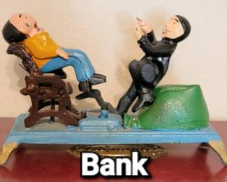 Antique shoe shiner money bank