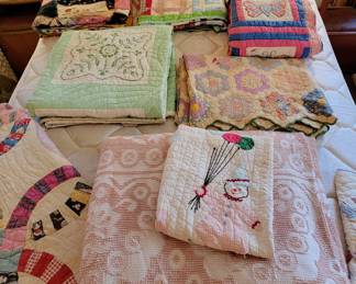 Several hand sewn QUILTS