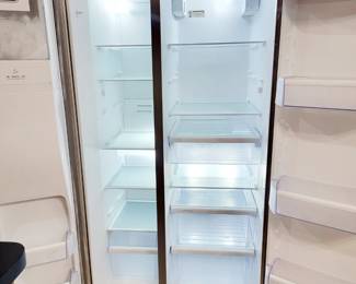 STAINLESS Whirlpool side by side refrigerator