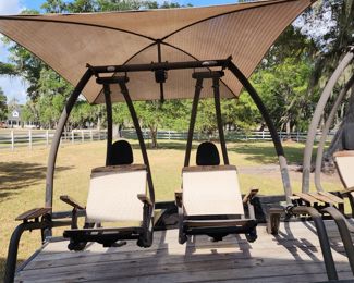 Really Cool Porch Swings and we have 2. They bought these at Houston Livestock Show.