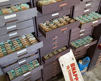 Metal cabinets full of watch crystals