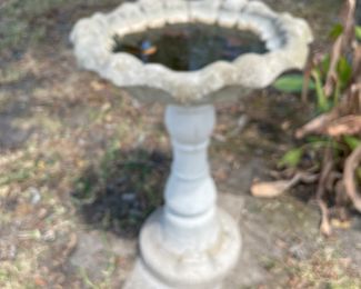 Concrete bird bath. 