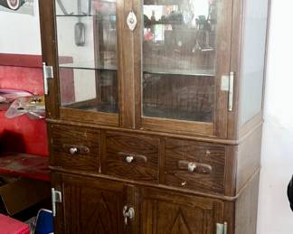 ANTIQUE INDUSTRIAL ERA METAL DISPLAY CABINET WITH FAUX WOOD GRAINED FINISH
