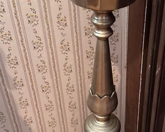 2 tall brass candleholders approx 3 feet