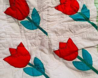 Many antique handmade quilts!