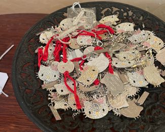 Hello Kitty charms and various styling elements for sale