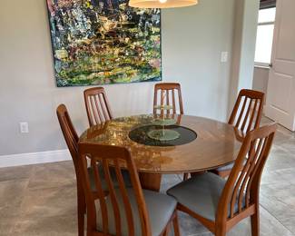 Round table with marble lazy Susan and 
6 chairs 