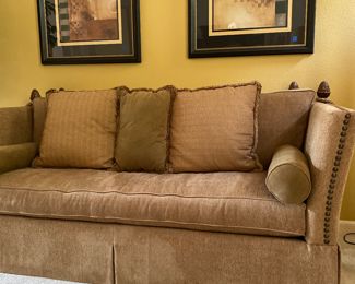 Comfortable and stylish with nailhead trim, and . decorated with pineapple finials and tassels. $995.00