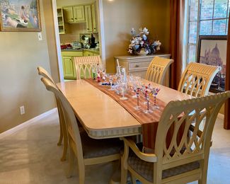 Lovely table with 2 arm chairs, and 4 straight chairs, and two leaves by Universal Furniture Company $960.00