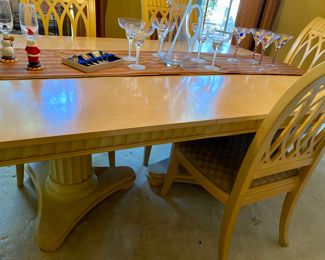 Twin pedestal base, table is 72 inches without leaves, 102 with leaves that are 15 inches each $960.00