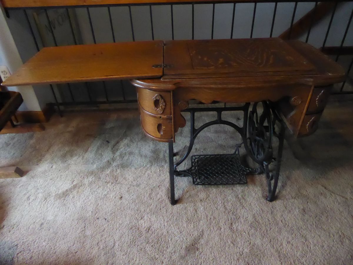 Vintage sewing machine buffet table