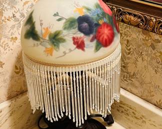 Unique little lamp with hand painted dome shade bearing tassels