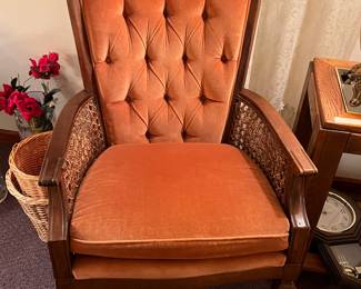 Mid Century orange upholstered chair with cane sides