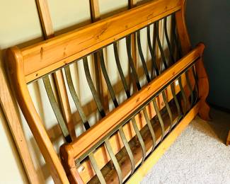 Queen sleigh bed headboard, footboard, and frame in wood and metal