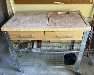 Nice portable butcher block top chefs prep table with shelves beneath