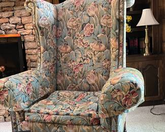 Needlework tapestry upholstered high back wing chair by William Switzer.  Very comfortable!