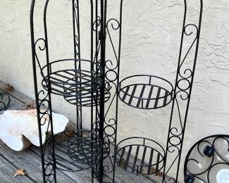Black metal plant stand with three divisions, folds up!