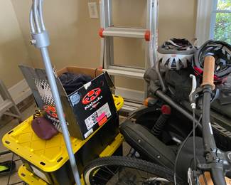 Floor lamp, ladder and Bike helmets.