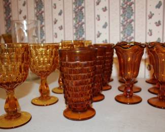 amber glassware; Fostoria American in the middle