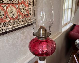 2 cranberry oil lamps