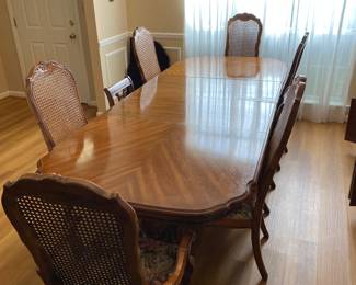 Louis XIV by Thomasville table, chairs, and hutch.