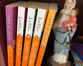 Looks like Mary and Baby Jesus with amazing hair are having a hard time holding back the flood of Ann B. Ross books!