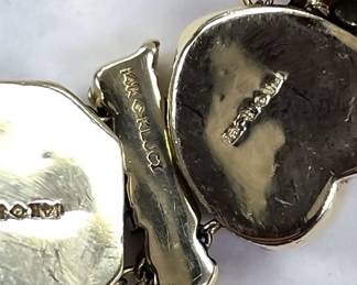 Richard Klein slide bracelet 14k yellow gold 33.39 dwt. Near mint condition. Set with Ruby, diamond, sapphire, emerald, amethyst, citrine, natural cameo, blue topaz, Opal, iolite, and rhodolite garnet.