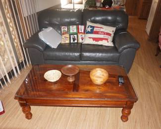 love seat, coffee table, pillows