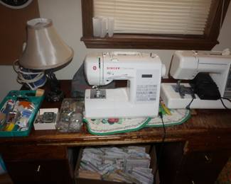 sewing machines, desk, lamp, notions