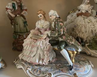 Dresden fine lace porcelain decorative statues that are  designed from 18 th century 