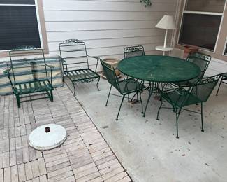 Iron patio table with 4 chairs plus 2 lounge chairs, side tables and water proof lamp