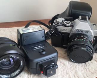 Canon AE-1 35mm camera with accessories