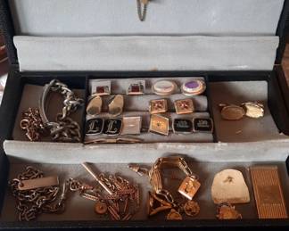 Assorted tie clips and cuff links