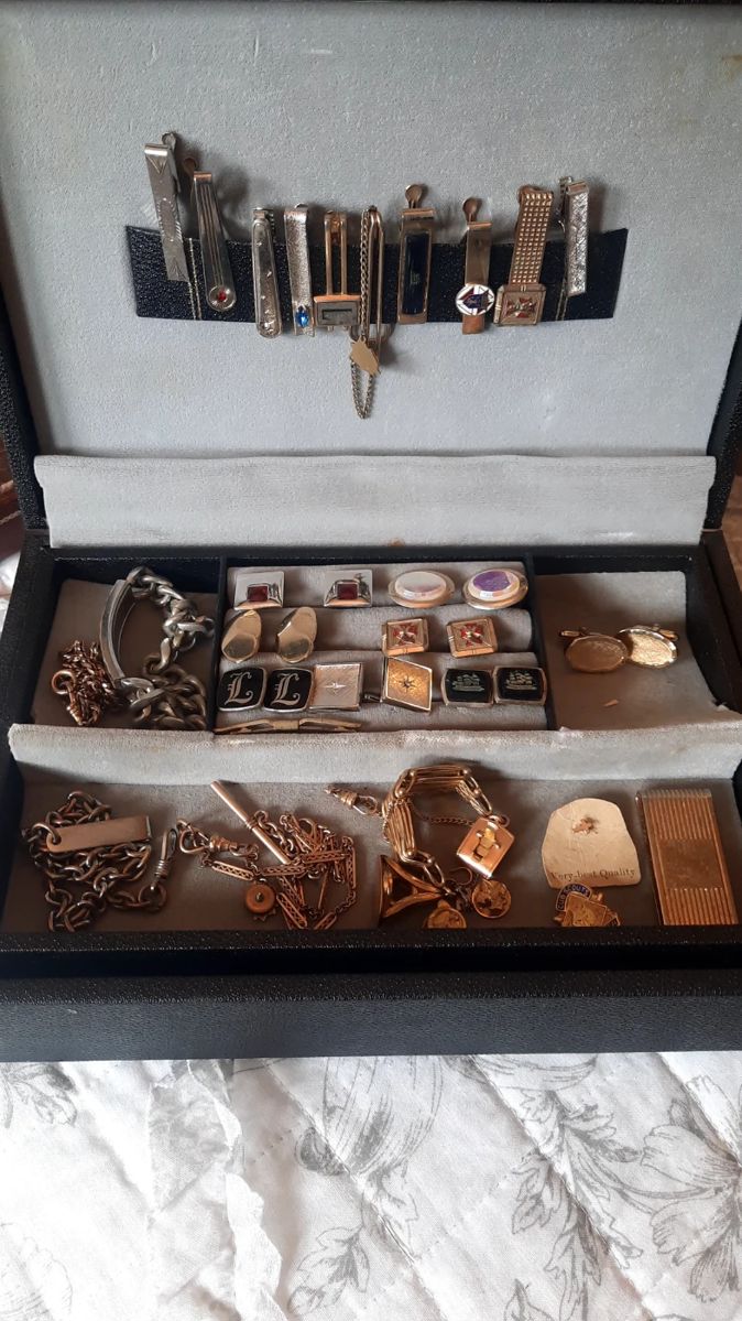 Assorted tie clips and cuff links
