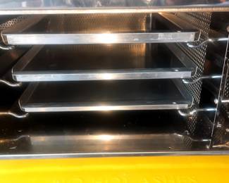 Inside of Spunkmeyer cookie oven with original trays