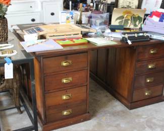 ONE SIDE OF A TWO PERSON DESK