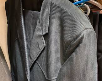 Nice selection of suits in master closet - apx 12 total - some are 3 pc with vest